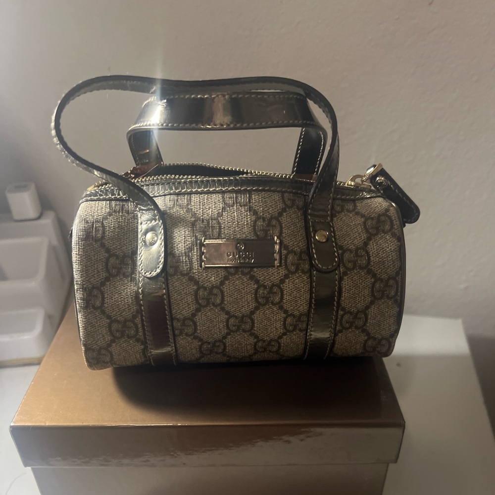 GUCCI
Monogram Micro Joy Boston Metallic